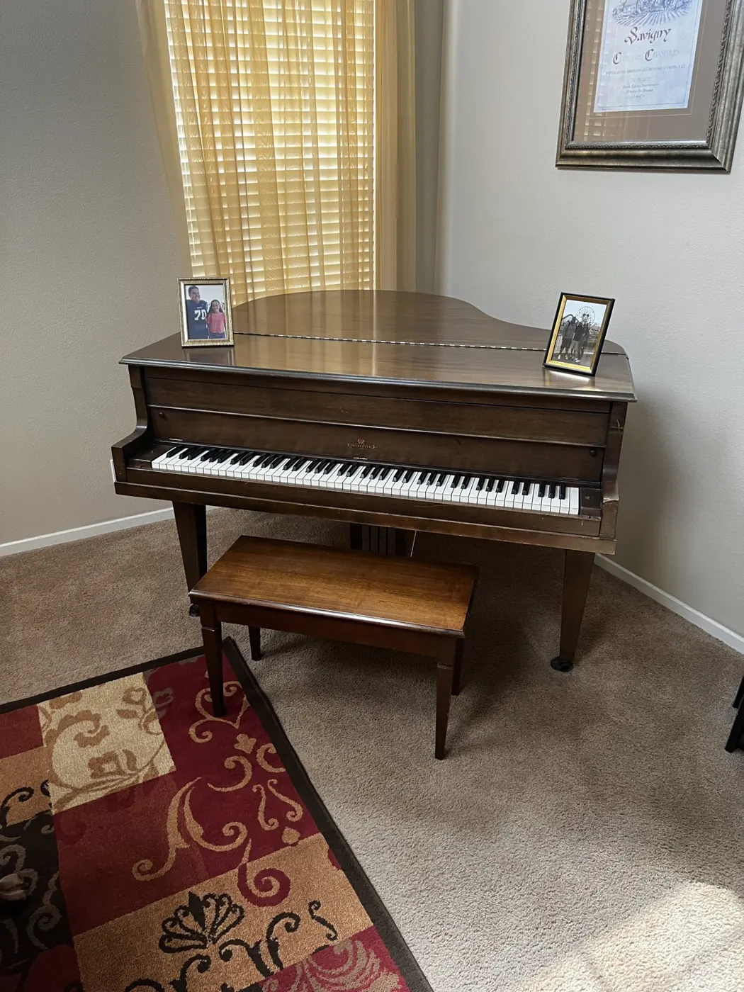 Baby grand piano before removal