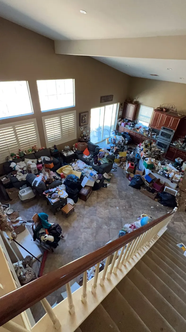Upstairs loft packed with belongings before an estate cleanout