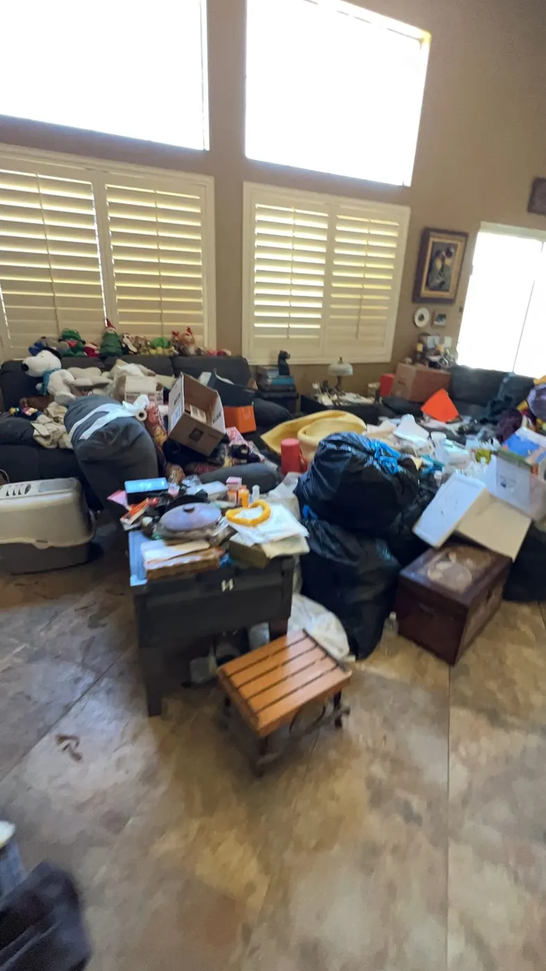 Room filled with belongings before a cleanout