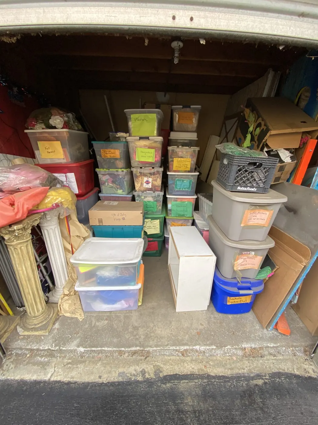 Storage unit full of bins and boxes