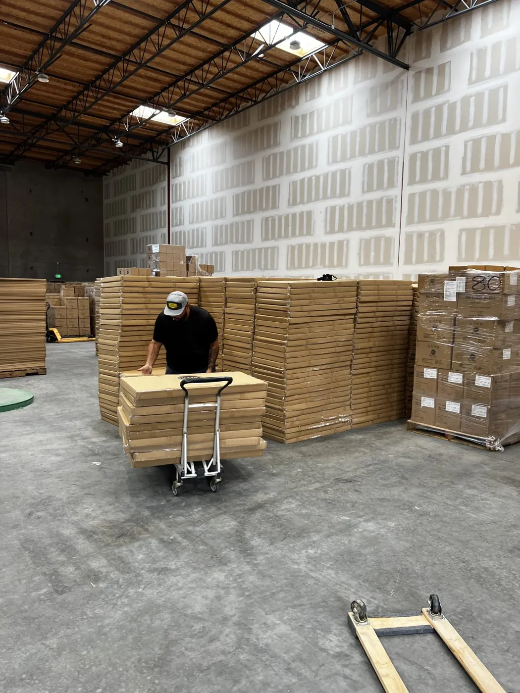 Crew moving boxes in a warehouse